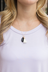 black pendant with tassel necklace