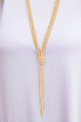 long gold knot necklace