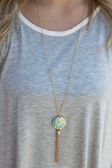 gold and turquoise speckled necklace