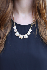 ivory speckled necklace