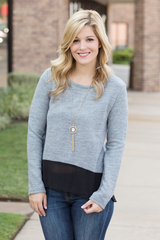 gray sweater with sheer bottom