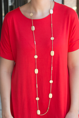 long gold geometric necklace