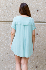 back of mint basic tee