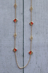 orange and gold aztec long necklace
