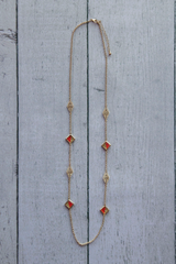 orange and gold aztec long necklace
