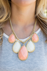 peach and white statement necklace