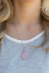 purple gemstone pendant