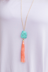turquoise stone with peach tassel necklace